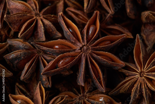 Dried chinese anise star spice background. close up top view