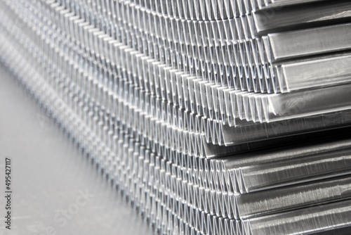 shiny waves of metal. bent aluminum foil. macro photo of corrugation