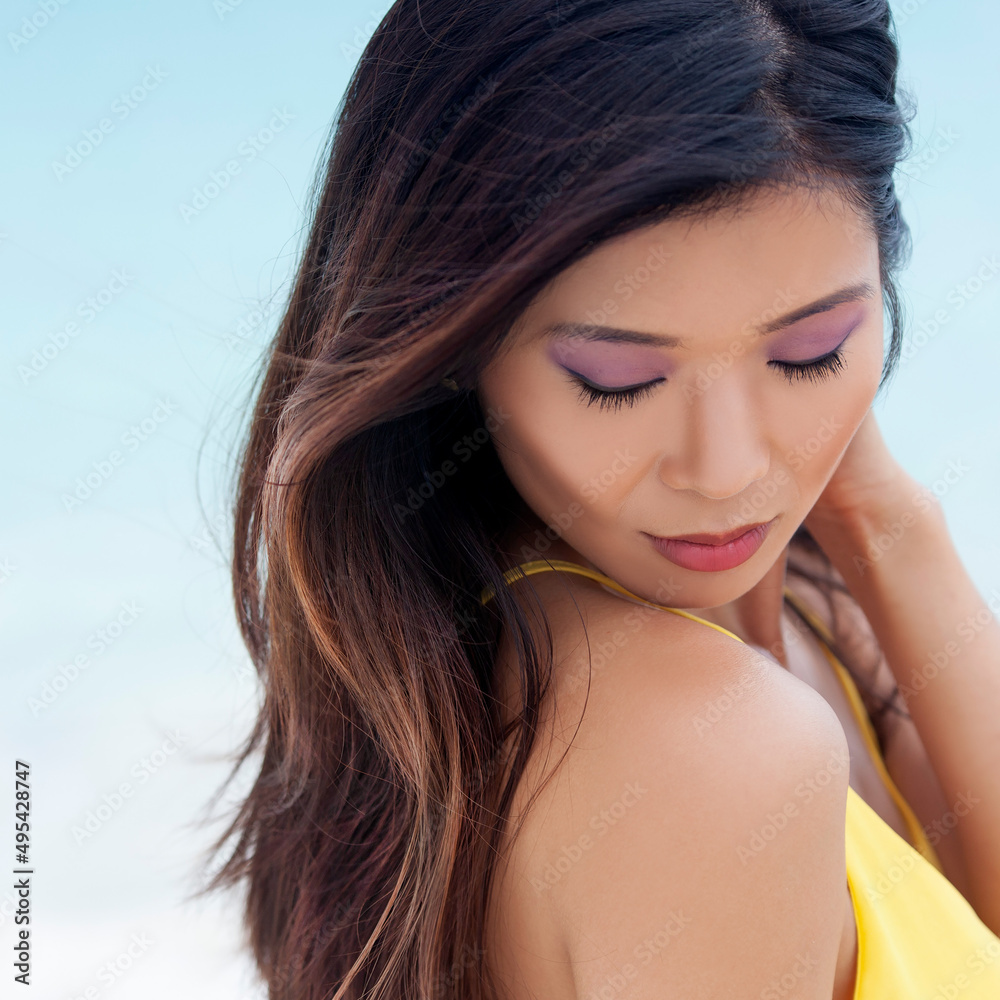 Beautiful Asian female relaxing outdoors on Summer vacation Beautiful Asian female relaxing outdoors on Summer vacation