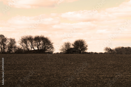 sepia photograph rural farmland black and white harvest field antique style scene