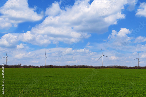 green farmland field wind turbine farm renewable energy environmental power turbines