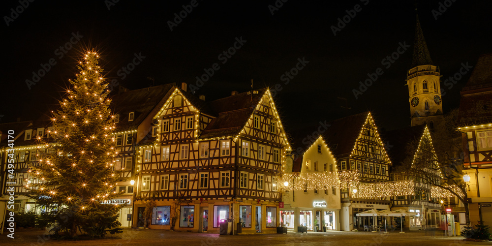 Half-timbered houses with christmas tree in the night