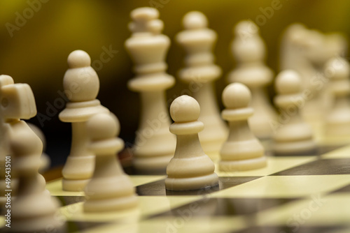 War between Russia and Ukraine  conceptual image of war using chess board  pieces and national flags on the background. Ukrainian   Russian crisis  political conflict. Stop the war 2022