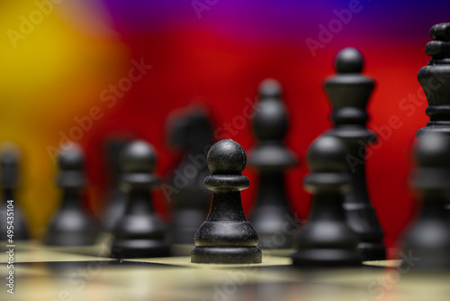 War between Russia and Ukraine  conceptual image of war using chess board  pieces and national flags on the background. Ukrainian   Russian crisis  political conflict. Stop the war 2022