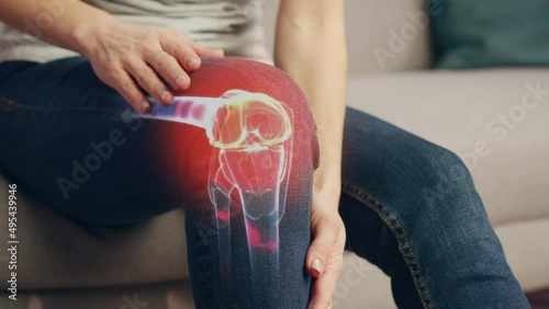 VFX Joint and Knee Pain Augmented Reality Animation. Close Up of a Person Experiencing Discomfort in a Result of Leg Trauma or Arthritis. Massaging the Muscles to Ease the Injury. photo