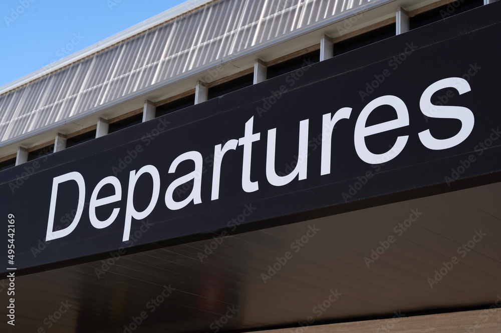 Departures sign at the entrance of an airport. Departures sign at the entrance of an airport.