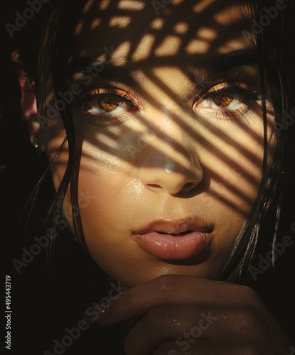 Portrait of brunette woman with brown eyes