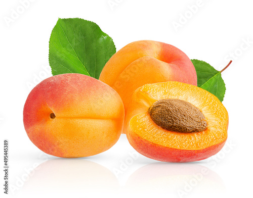 Heap of apricots and leaves isolated on white background with clipping path.