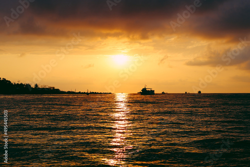 Sunset at sea. Orange sun, summer. Ships. High quality photo © Екатерина Бучинская