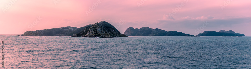 A view passing the Cies islets at sunset near Vigo, Spain on a spring day