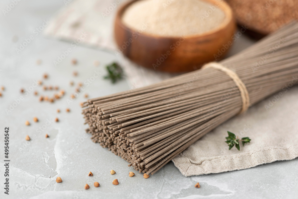 gluten-free buckwheat noodles on a wooden table gluten-free buckwheat noodles on a wooden table