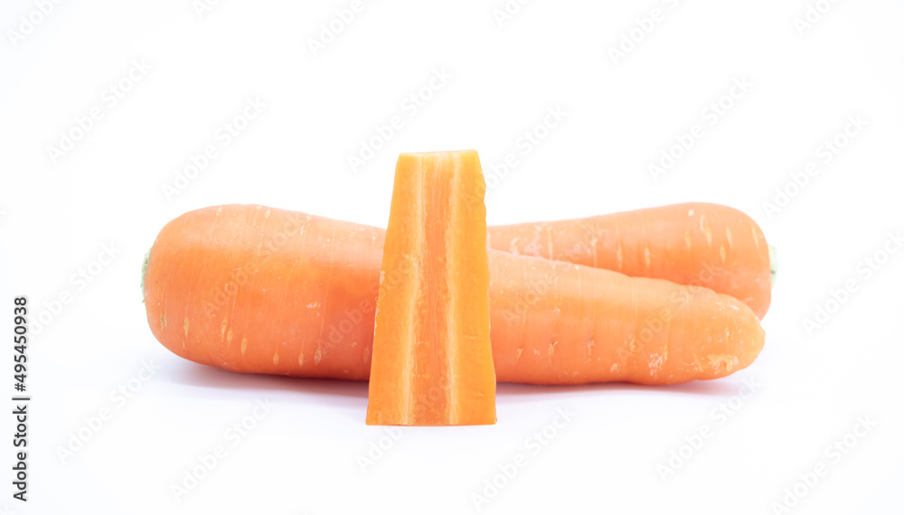 whole carrot and cut carrot pieces isolated on white background as package design element whole carrot and cut carrot pieces isolated on white background as package design element