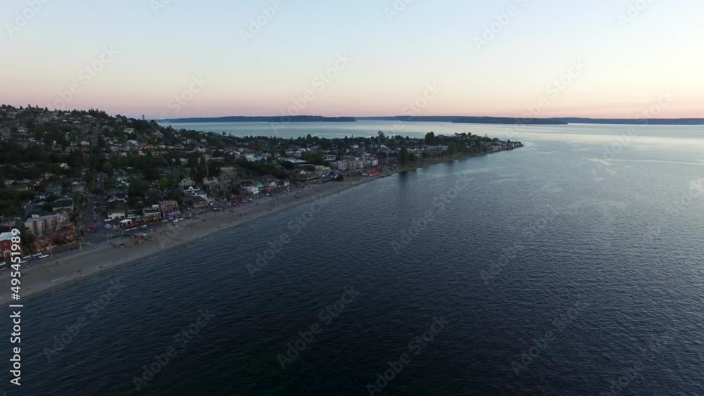 Wide establishing aerial shot of the Alki Beach shoreline in West Seattle. Wide establishing aerial shot of the Alki Beach shoreline in West Seattle.