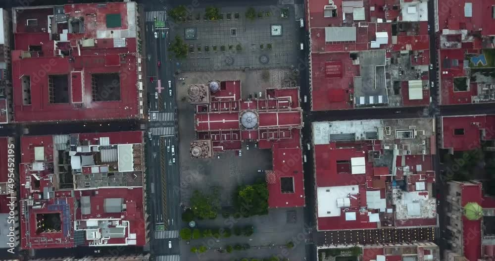 Drone flies over Morelia, Michoacan, Mexico at sunrise. Drone spinning slowly high above the cathedral and main plaza. Drone flies over Morelia, Michoacan, Mexico at sunrise. Drone spinning slowly high above the cathedral and main plaza.
