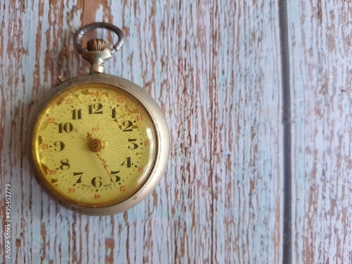 Old pocket watch. made in Switzerland. Top view space for text.