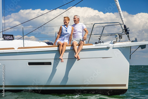 Travel fun for senior couple on luxury yacht