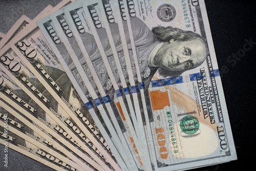 Spread out 100 US Dollar banknotes