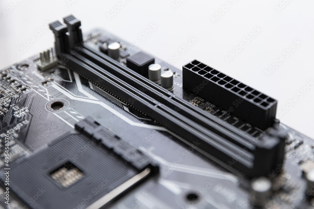 close-up of connecting RAM on a computer motherboard close-up of connecting RAM on a computer motherboard