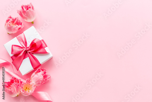 Happy Mothers day. Pink flowers with white gift box © 9dreamstudio