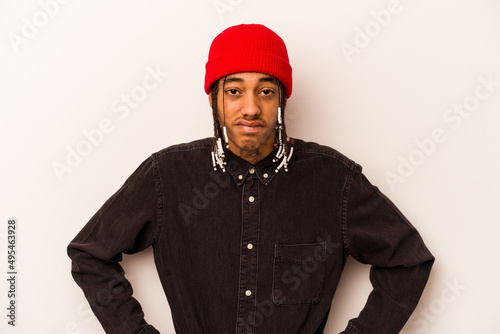 Young African American man isolated on white background sad, serious face, feeling miserable and displeased. © Asier