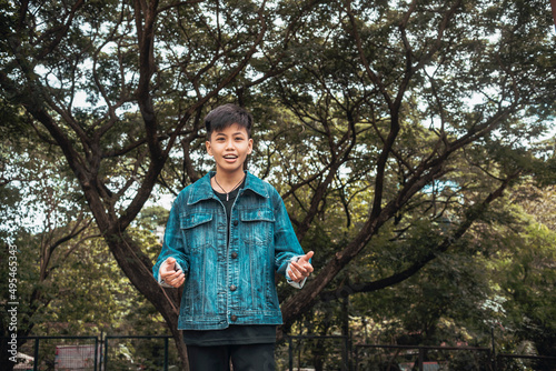 A young handsome man surprised meeting his friend. Shocked about the person's good look. photo