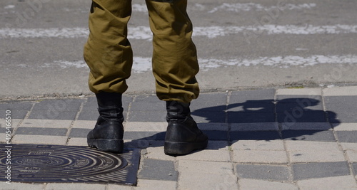 Soldier's boots on the feet of an Israeli soldier. Concept: Soldiers IDF - Israel Defense Forces (Tzahal), IsraelI soldiers, Israeli army photo