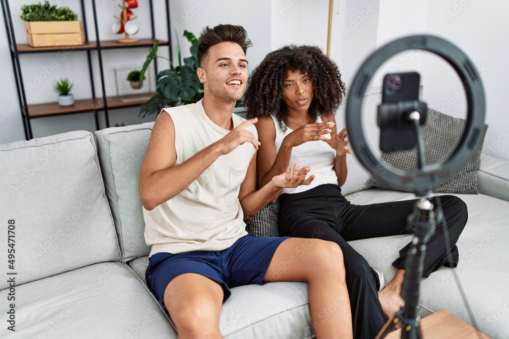 Man and woman couple using smartphone having video call at home Man and woman couple using smartphone having video call at home