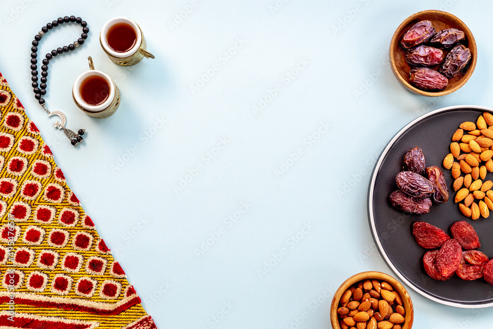 Ramadan background - Islamic prayer carpet with dates and rosary