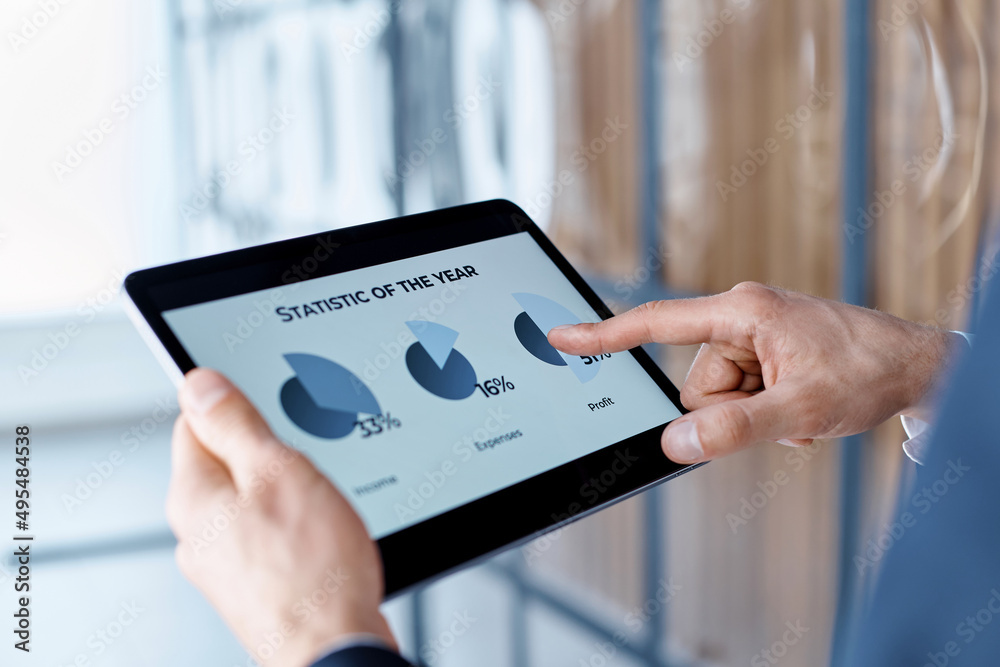 businessman looking at the annual chart of the cryptocurrency exchange rate. businessman looking at the annual chart of the cryptocurrency exchange rate.