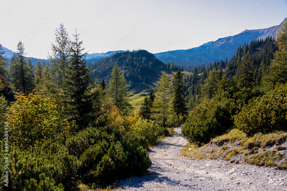 A hiking trail with a panoramic view on the mountain peaks of the Hochschwab Region in Upper Styria, Austria. Alps in Europe. Journey, wilderness. Concept freedom. Sackwiesenalm, Haeuselalm
