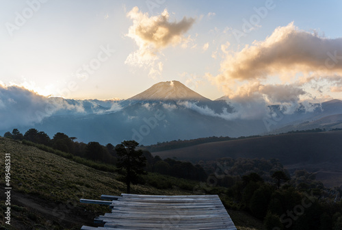 Mirador del Volcan Lonquimay y Volcan Tolhuaca en el ocaso de Otoño photo