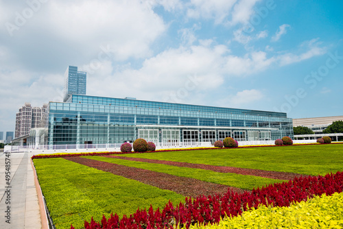 Office building with glass facade and outside square