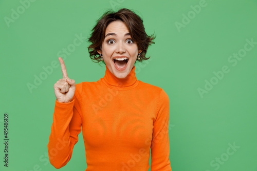 Fotografija Young smiling insighted smart fun proactive woman 20s wear casual orange turtlen
