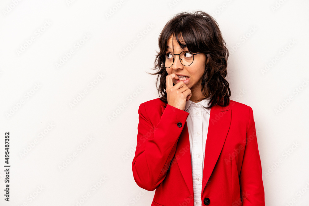 Young business hispanic woman isolated on white background relaxed thinking about something looking at a copy space. Young business hispanic woman isolated on white background relaxed thinking about something looking at a copy space.