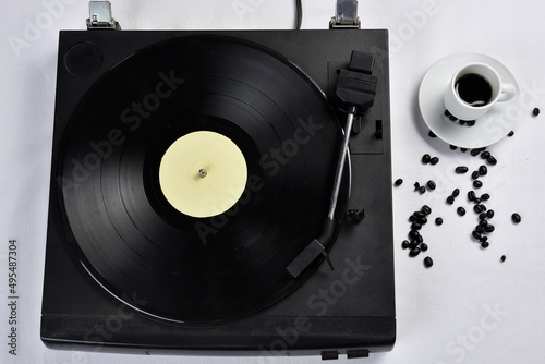 vinyl record object retro for decoration, cup of coffee beside isolated on white background