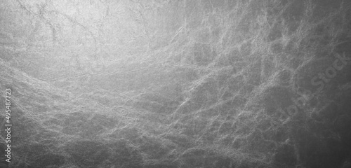 Close-up photo of the texture of black faux leather for the background. faux leather background. photo
