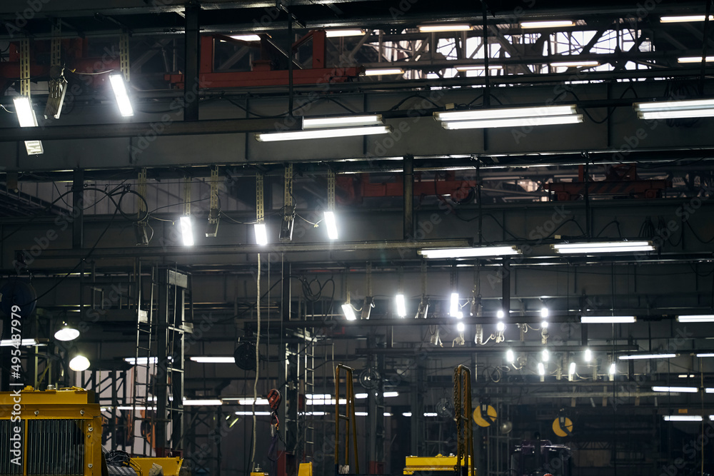 Fototapeta premium a lamp burning in the dark of factories