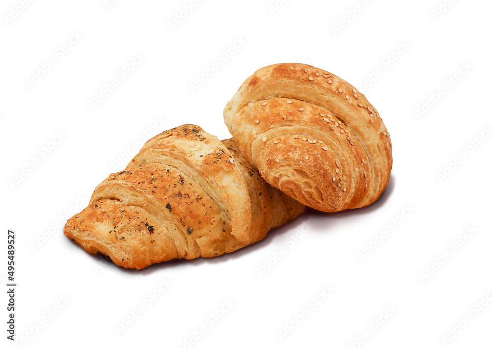 Croissants on the plate with the white background Croissants on the plate with the white background