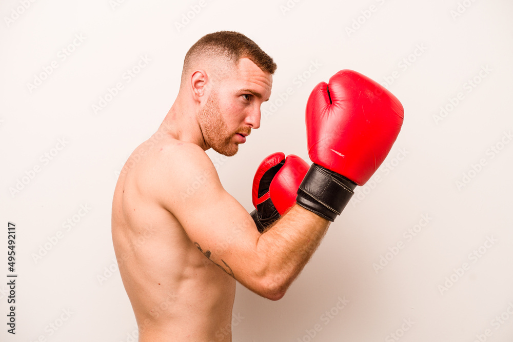 Young caucasian man doing boxing isolated on white background Young caucasian man doing boxing isolated on white background