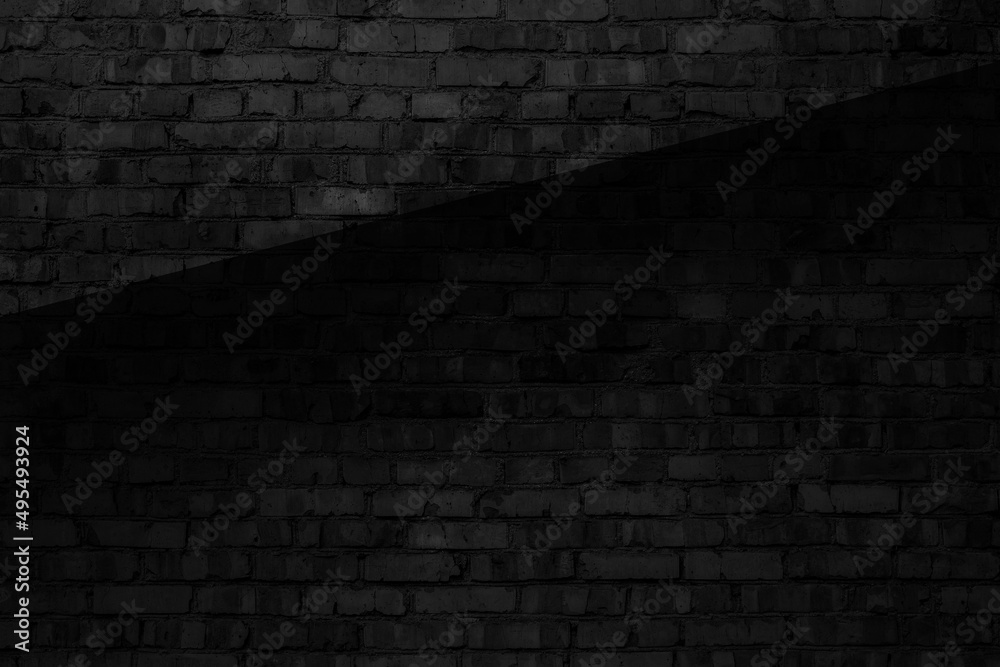 Black brick wall. Dark textured wallpaper