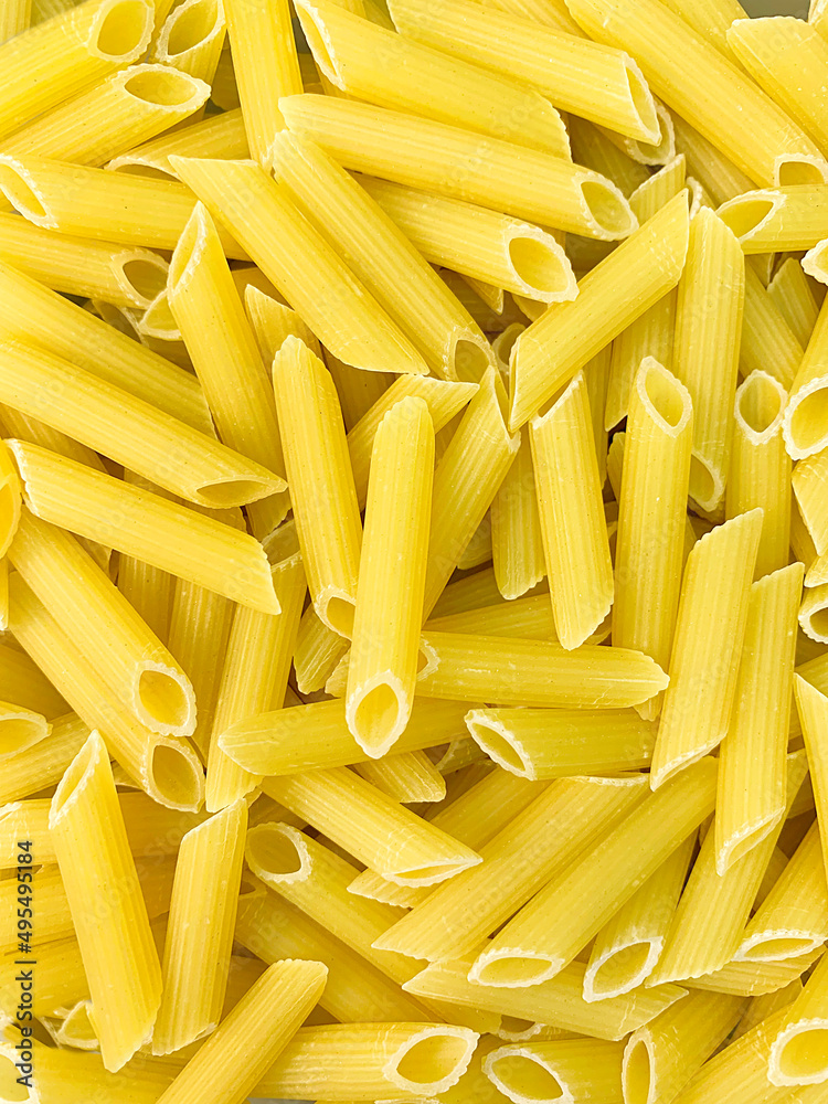 Pasta close-up, top view. Food background. Dry pasta. Food concept. Texture. Pasta close-up, top view. Food background. Dry pasta. Food concept. Texture.