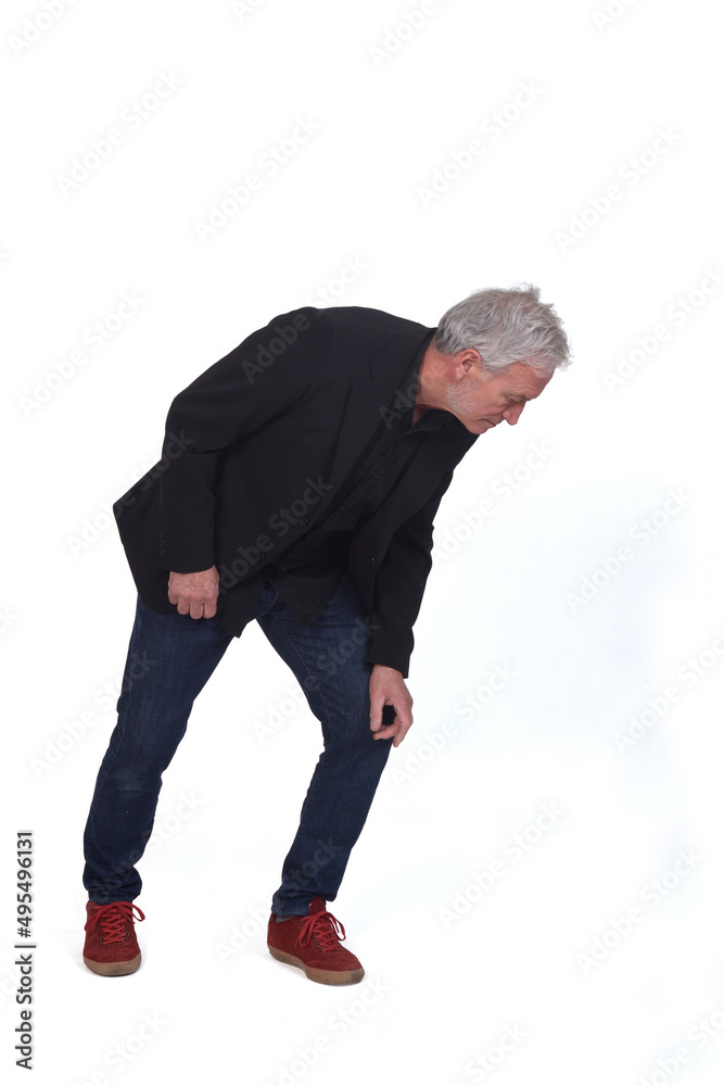 Fototapeta premium man searching on the floor on white background