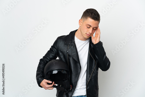 Caucasian man with a motorcycle helmet isolated on white background with headache