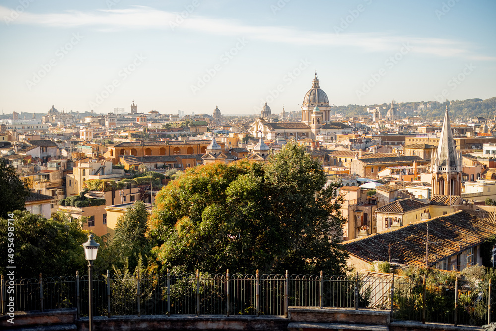 Cityscape of Rome city on a sunny morning. Top view from Borghese park. Skyline of italian city