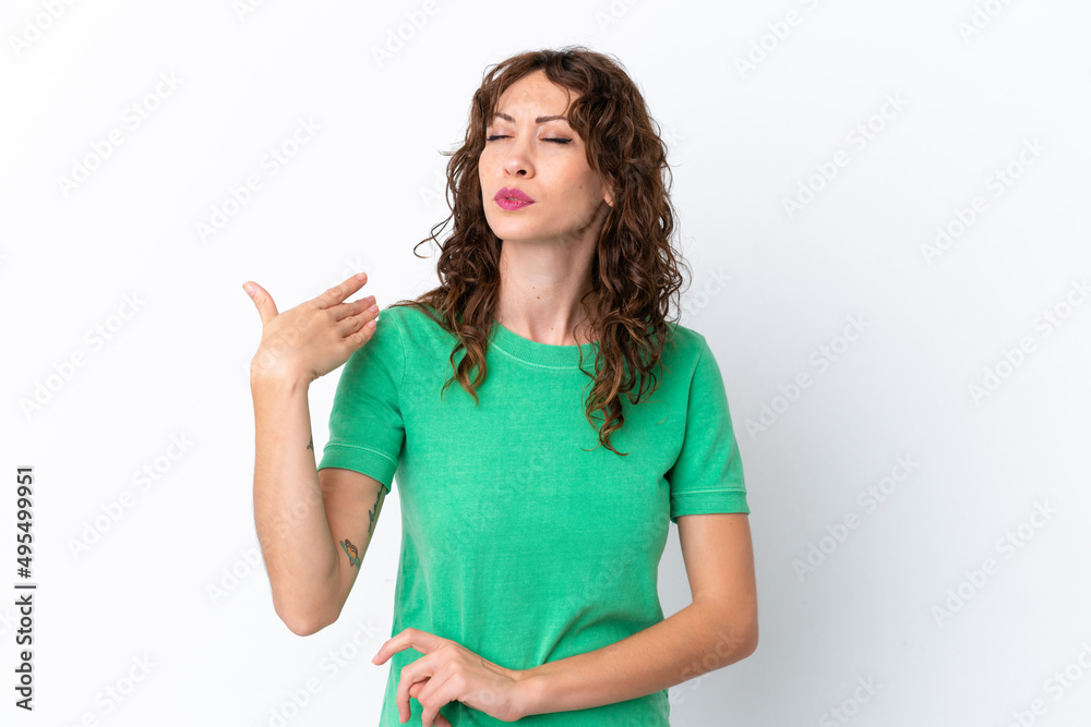 Young woman with curly hair isolated on white background with tired and sick expression Young woman with curly hair isolated on white background with tired and sick expression
