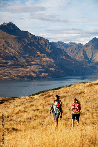Adventure couple New Zealand outdoor hiking Lake Wakatipu