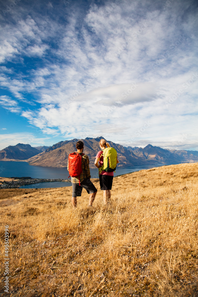 Caucasian couple spending vacation hiking outdoors The Remarkables
