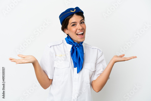 Airplane stewardess caucasian woman isolated on white background with shocked facial expression