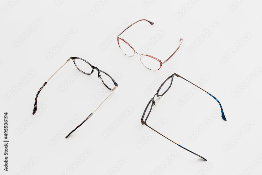 Workspace with three glasses on a white background. Workspace with three glasses on a white background.