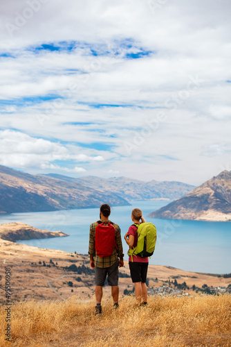 Young hikers viewing Landscape Lake Wakatipu New Zealand